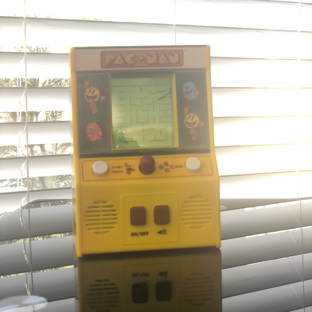 Mini hand held pac man arcade game